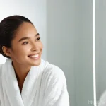 여드름 전용 스킨케어 추천 - **Prompt:** "A young woman (18-25 years old) with radiant, clear, and healthy skin, gazing confident...